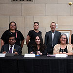 Group photo of the leaders of the Anishinabe Algonquin Nation with Minister Anandasangaree.